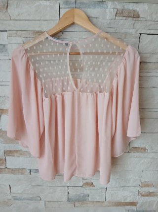 Camisa de mujer rosa con transparencias