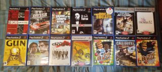 PlayStation 2 + EyeToy + 17 juegos + 2 memory card