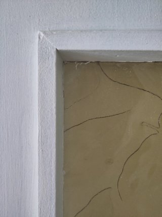 Puerta madera con cristal decorado