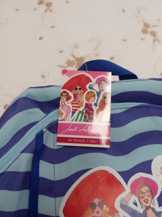 Mochila de rayas azules con estampado