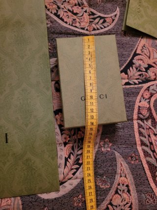 Sacchetto e scatola Gucci verdi