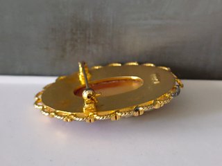 Broche camafeo vintage en tono rojizo