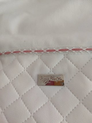 Saco silla bebé polipiel blanco y rosa