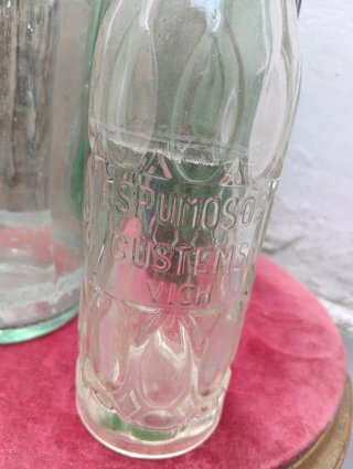 Collezione di bottiglie Coca Cola retrò