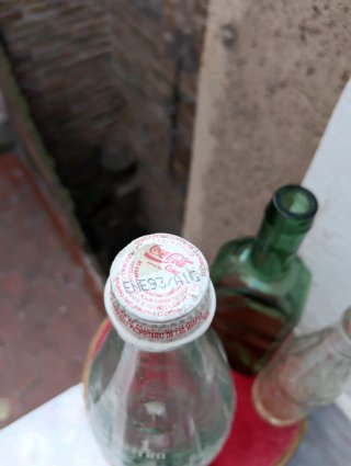 Collezione di bottiglie Coca Cola retrò