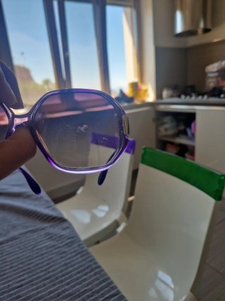 Occhiali da sole viola