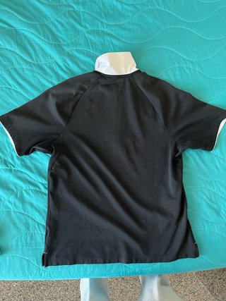 Polo Nike nero con colletto bianco