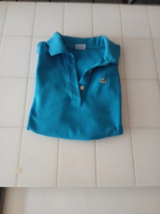 Polo sin mangas Lacoste azul talla M