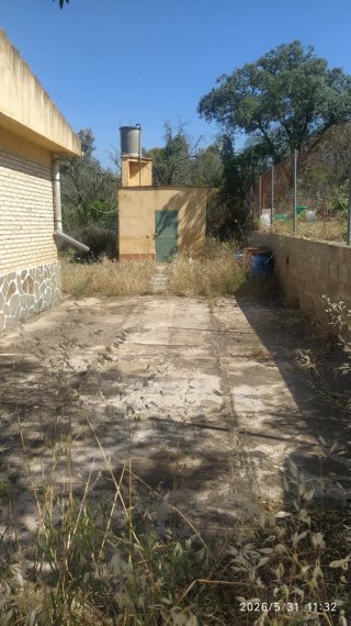 Venta de terreno con vivienda independiente
