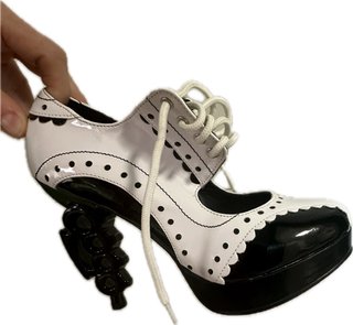 Zapatos tacón puńo americano