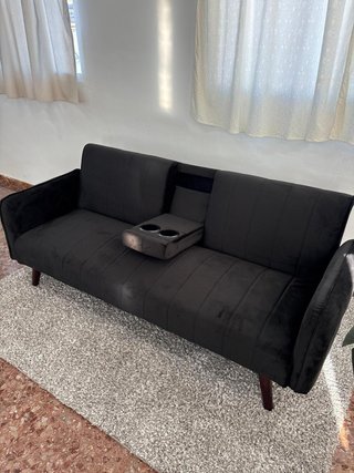 En oferta sofá cama negro cómodo