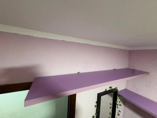 Cama alta con escalera y armario
