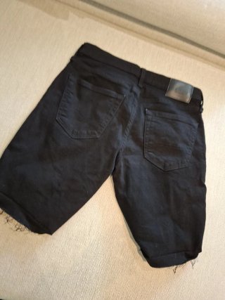 Shorts negros Hollister W30 rotos