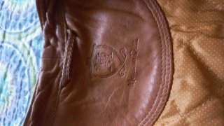 Chaqueta de cuero marrón para mujer