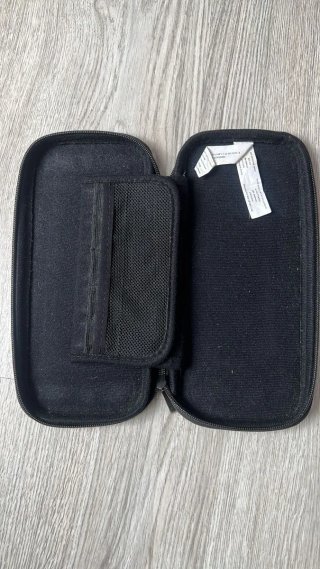 Funda Nintendo Switch con compartimentos