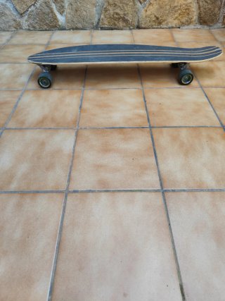 Longboard Oxelo con ruedas verdes
