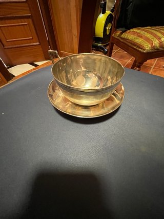 Taza y plato de plata