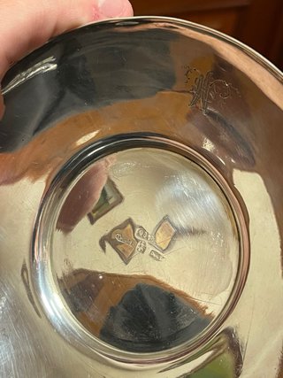 Taza y plato de plata
