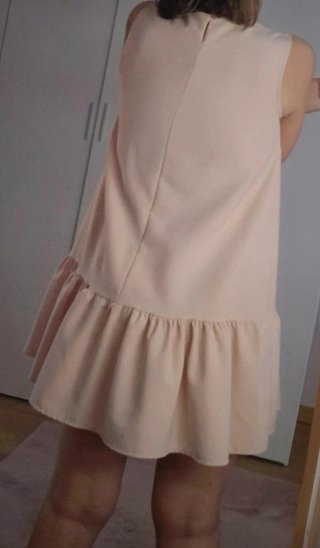 Vestido rosa corto con volante Muñeca de Trapo