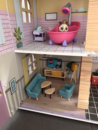 Casa de muñecas de madera
