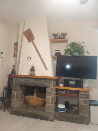 Chimenea de leña piedra y madera