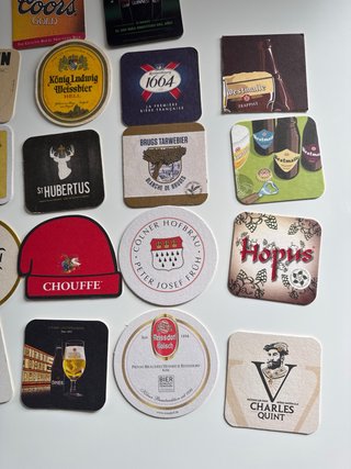 Set di 22 sottobicchieri per birra di marche diverse