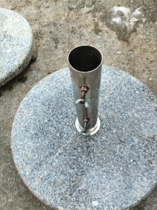 Bases para sombrilla de piedra y metal