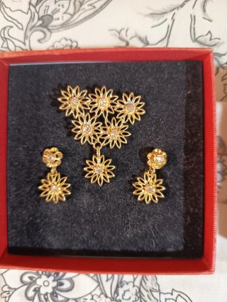 Dos aderezos bebe, chapados en oro , 25 € unidad