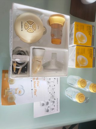 Sacaleches Medela Swing Maxi Flex con muy muy poco