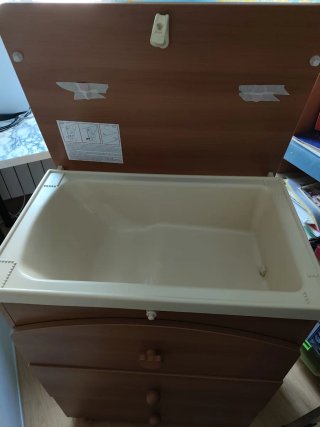 Cómoda cambiador con bañera