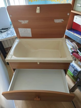 Cómoda cambiador con bañera