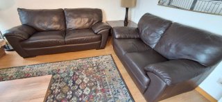 OFERTA NATUZZI Sofás 3+2 plazas de piel con mesa