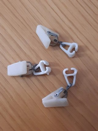 Ganci per tende con pinza