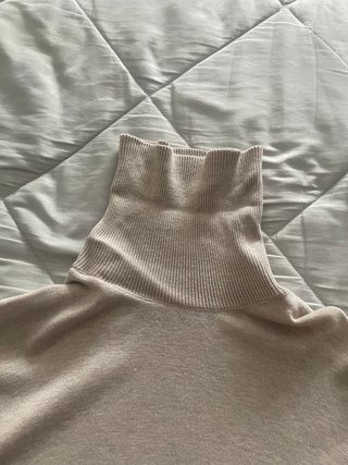 Jersey cuello vuelto alto beige