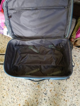 Maleta John Travel con ruedas azul