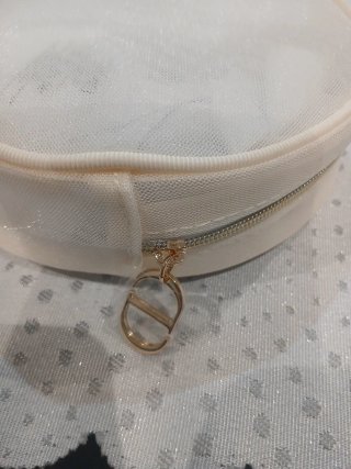 Pochette tonda Dior farfalle rosa e oro