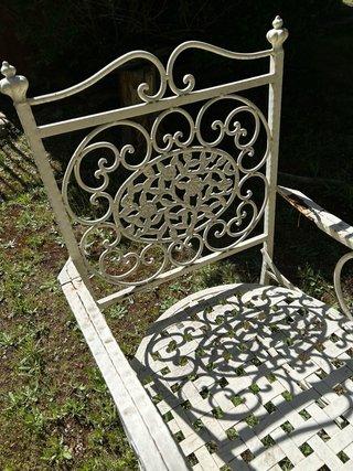 Mesa y 6 sillones de hierro forjado