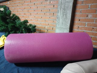 Esterilla rosa para yoga o ejercicio