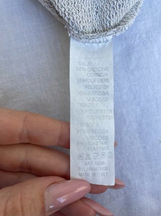 Felpa lunga grigia con inserti geometrici
