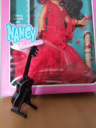 Nancy Flamenca precintada + guitarra a su medida
