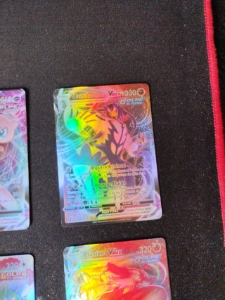 Cartas Pokémon VMAX, EX y GX