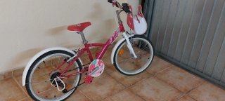 Bicicleta niña 20 rosa con bolso. Btwin decathlon