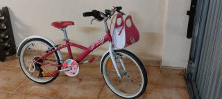 Bicicleta niña 20 rosa con bolso. Btwin decathlon