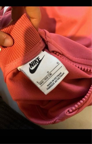 Tuta Nike bambina rosa/rossa