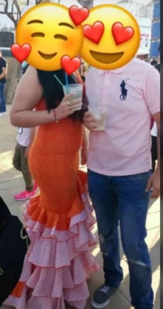 Traje de flamenca naranja con volantes
