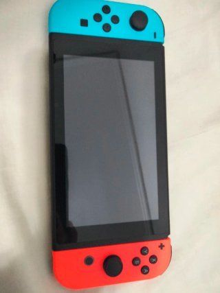 Consola Nintendo Switch Azul y Naranja