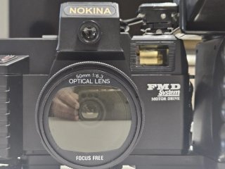 Antica Fotocamera Nokina FMD System Motor Drive