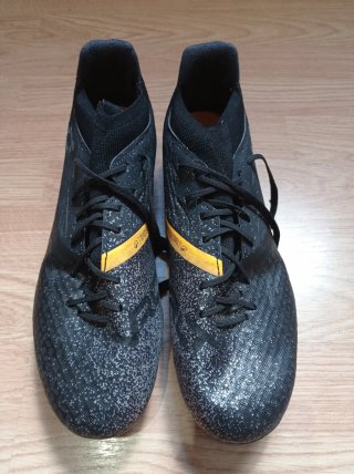 Zapatos de fútbol Kipsta Viralto I Negro/Naranja