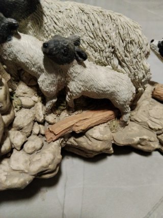 Figura de ovejas y perro