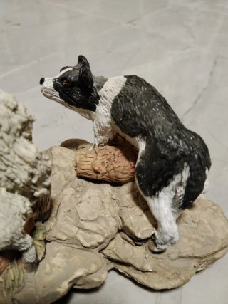 Figura de ovejas y perro